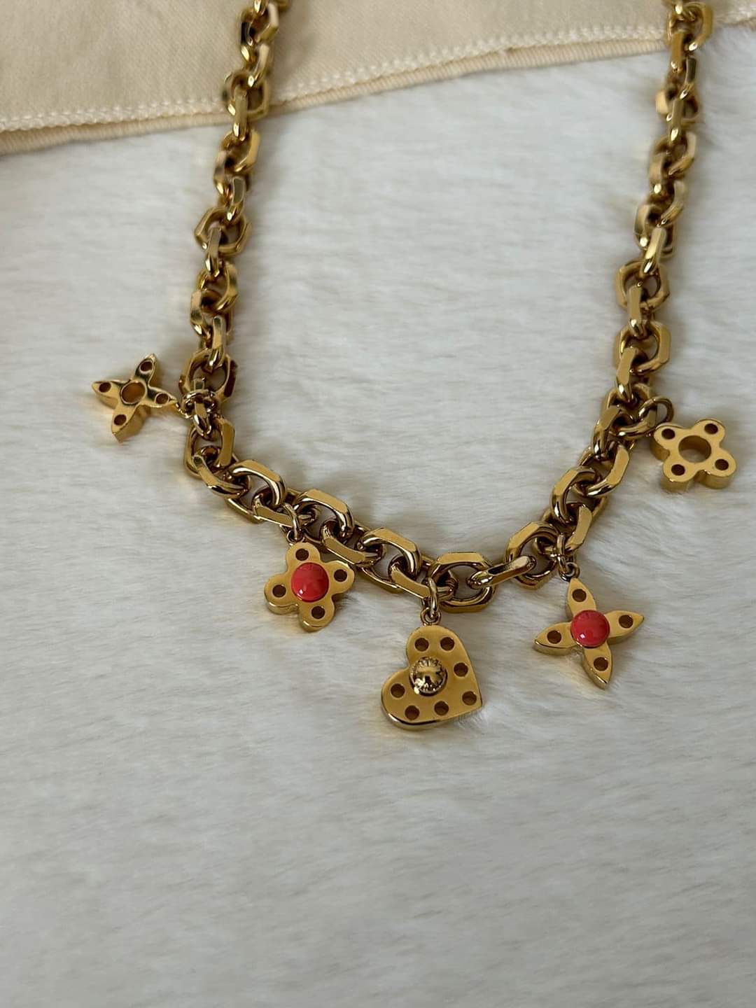 Louis Vuitton Vintage Hide And Seek Necklace in Metallic